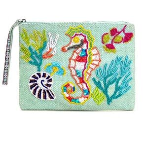 New with tags. Hand beaded embellished wristlet. Seahorse